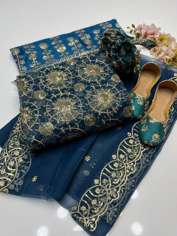 Latest Fancy Collection – Organza Sequence Work Duppata, Shirt & Trouser with Kataan Embroidery, Khussa & Bagyar